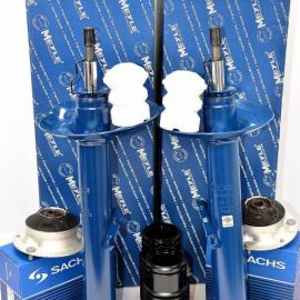 2x tlmiče a uloženie tlmiča, prachovky a dorazy predná náprava BMW 3er E36