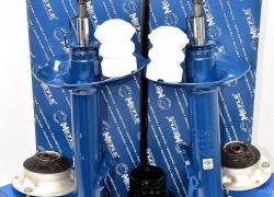 2x tlmiče a uloženie tlmiča, prachovky a dorazy predná náprava BMW 3er E36