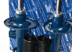 Tlmiče, dorazy a prachovky predné VW T5